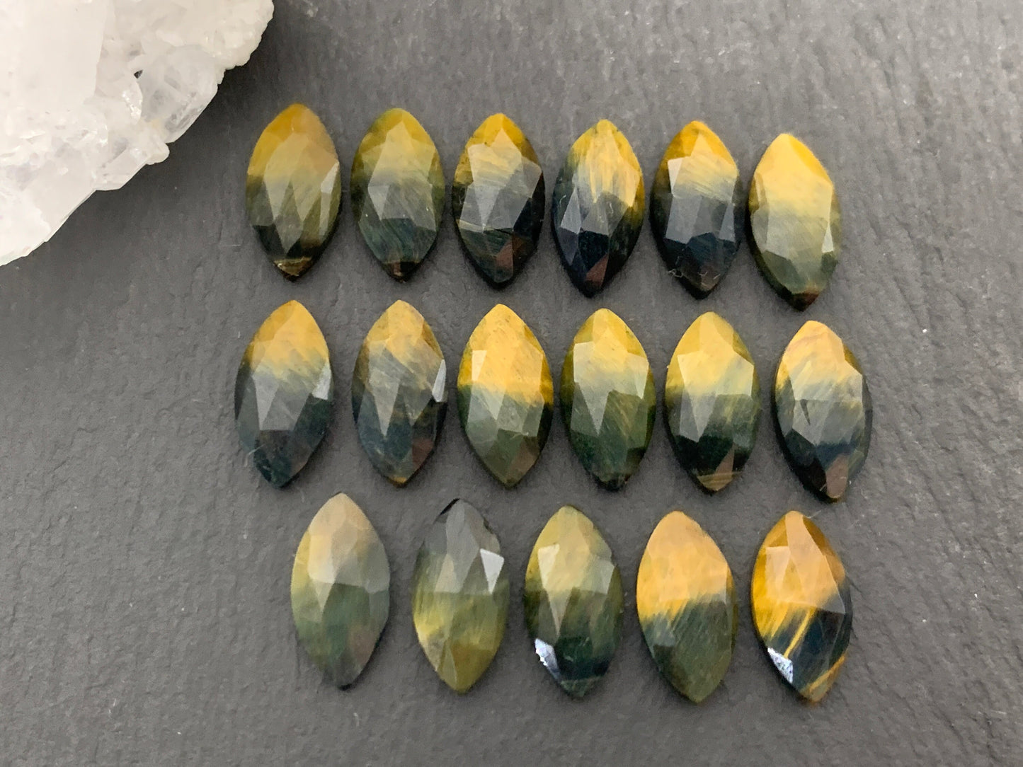 Faceted Yellow Tiger Eye marquise 7x14mm cabochon