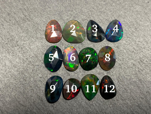 Faceted Black Opal free form 7-9mm long cabochon