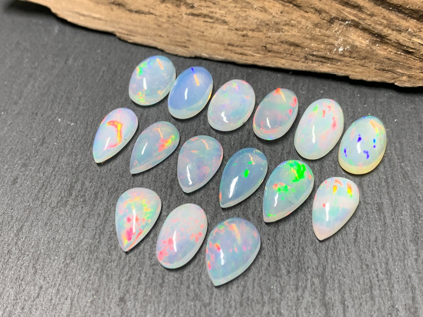 Ethiopian Opal 12-14mm long cabochon - pear, oval