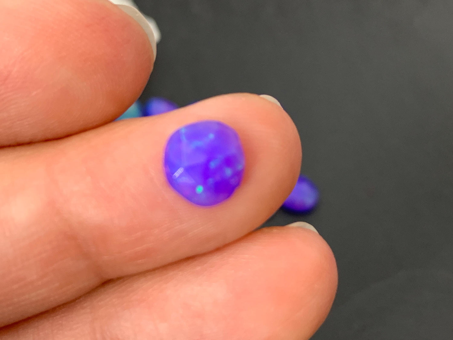 Faceted Purple Ethiopian Opal 7-8mm cabochon