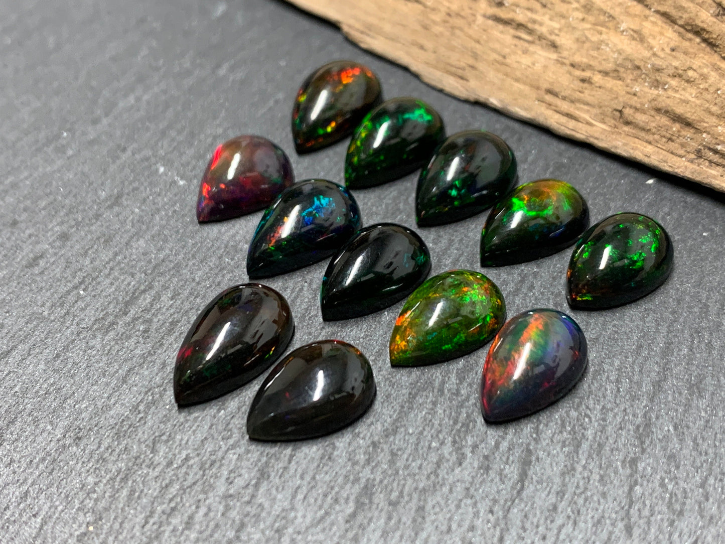 Black Ethiopian Opal pear 12-13mm long cabochon