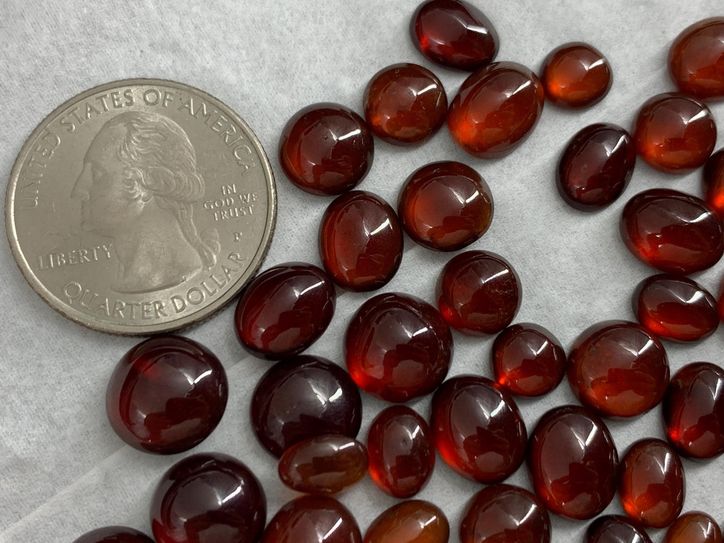 Hessonite Garnet oval, round 7-11mm long cabochon