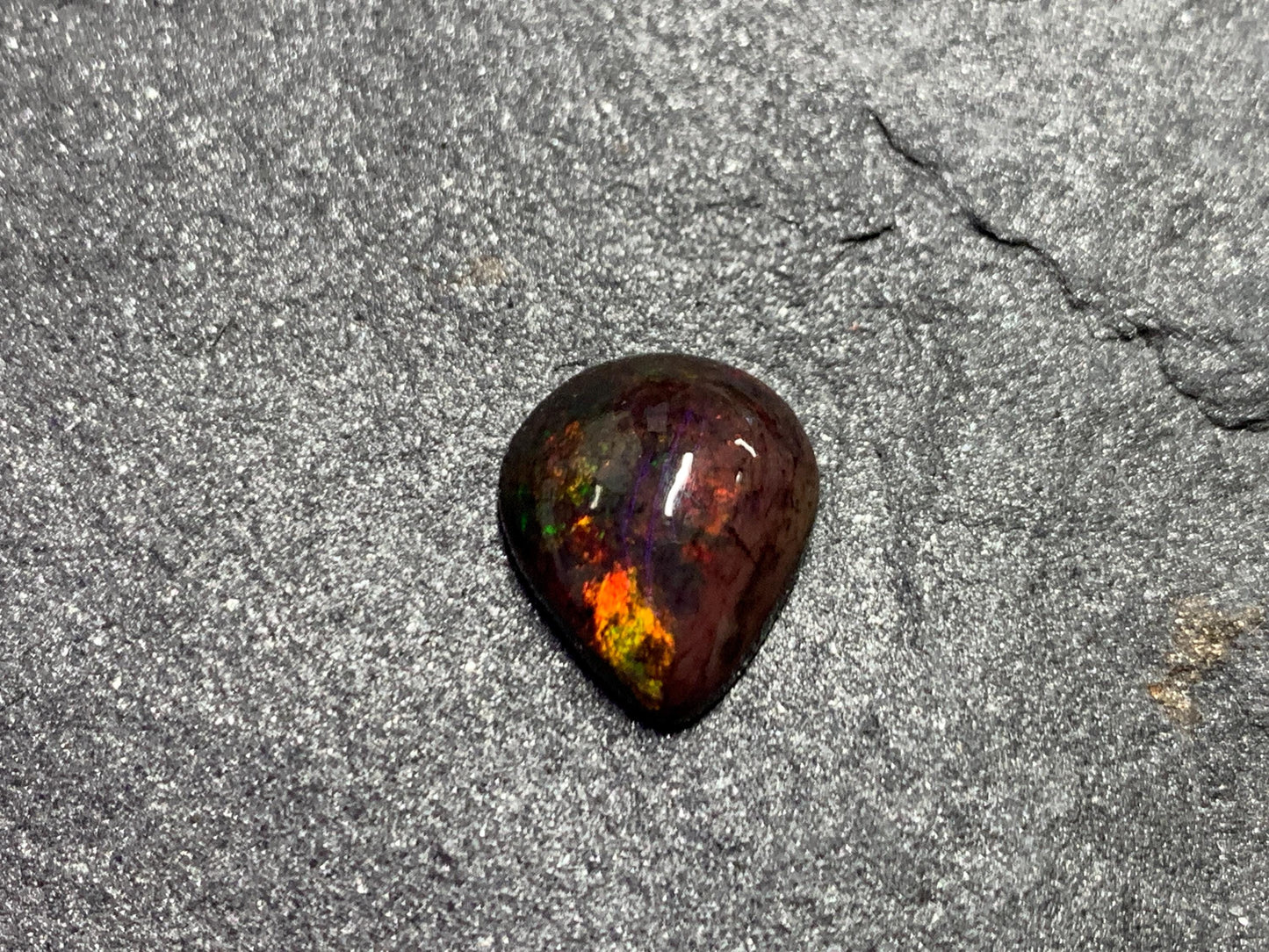Black Ethiopian Opal pear 10x12x4mm cabochon