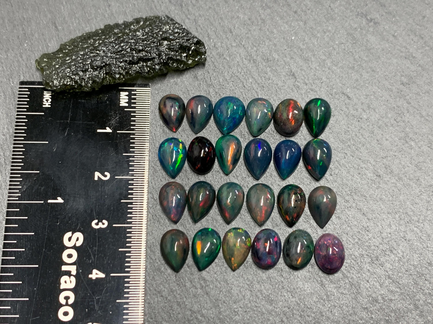 Black Ethiopian Opal pear 8-9mm long cabochon
