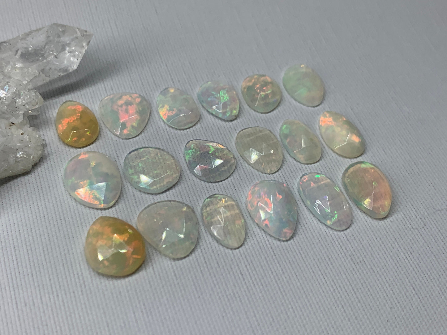 Faceted Ethiopian Opal 10-12mm long cabochon