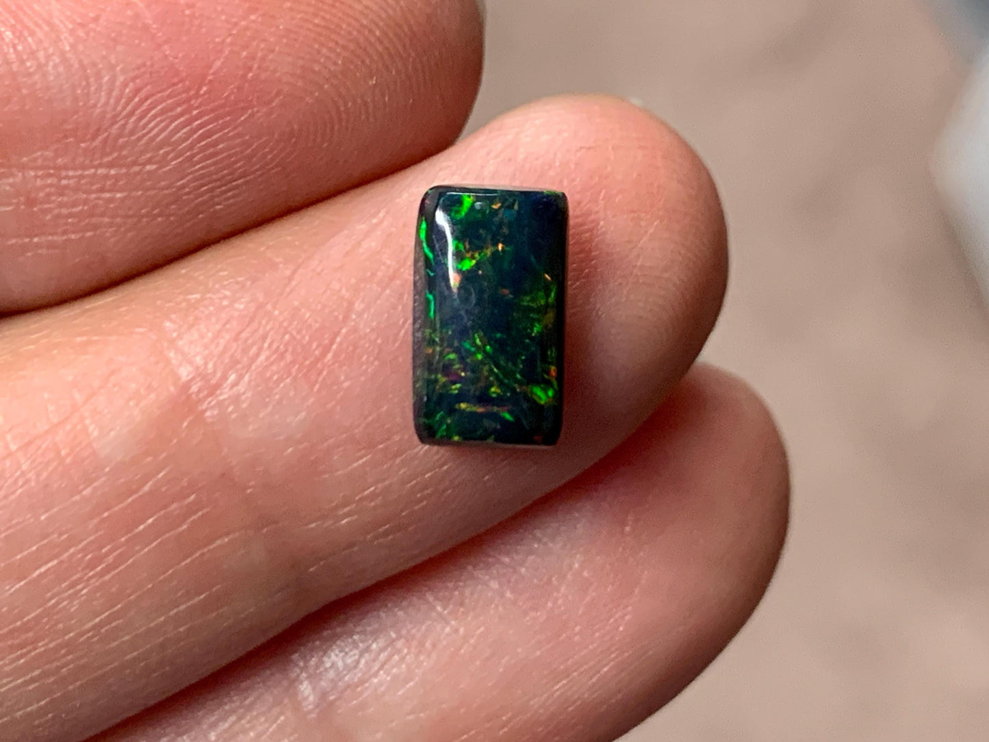 Black Ethiopian Opal rectangle 6x10x3mm cabochon