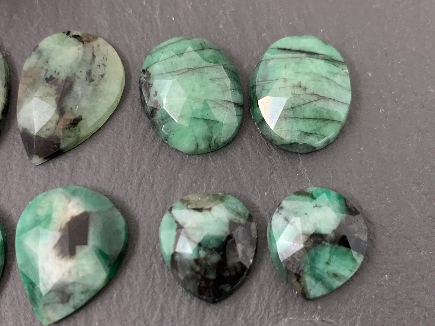 Faceted Emerald Pair 10-16mm long cabochons