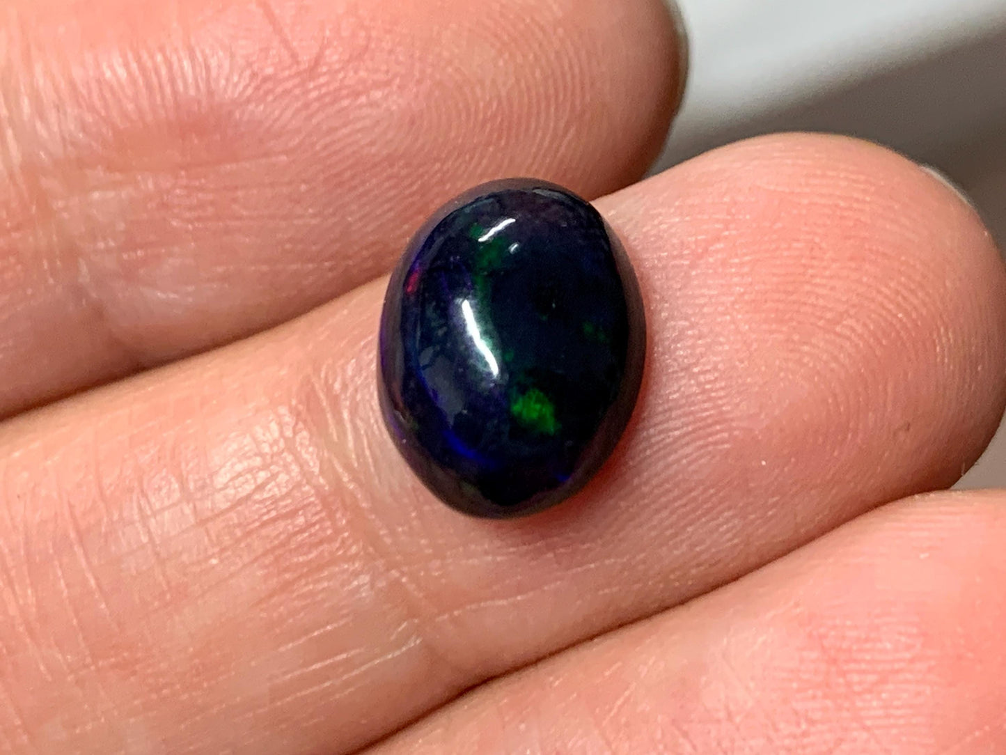 Black Ethiopian Opal oval 9x11x4mm cabochon