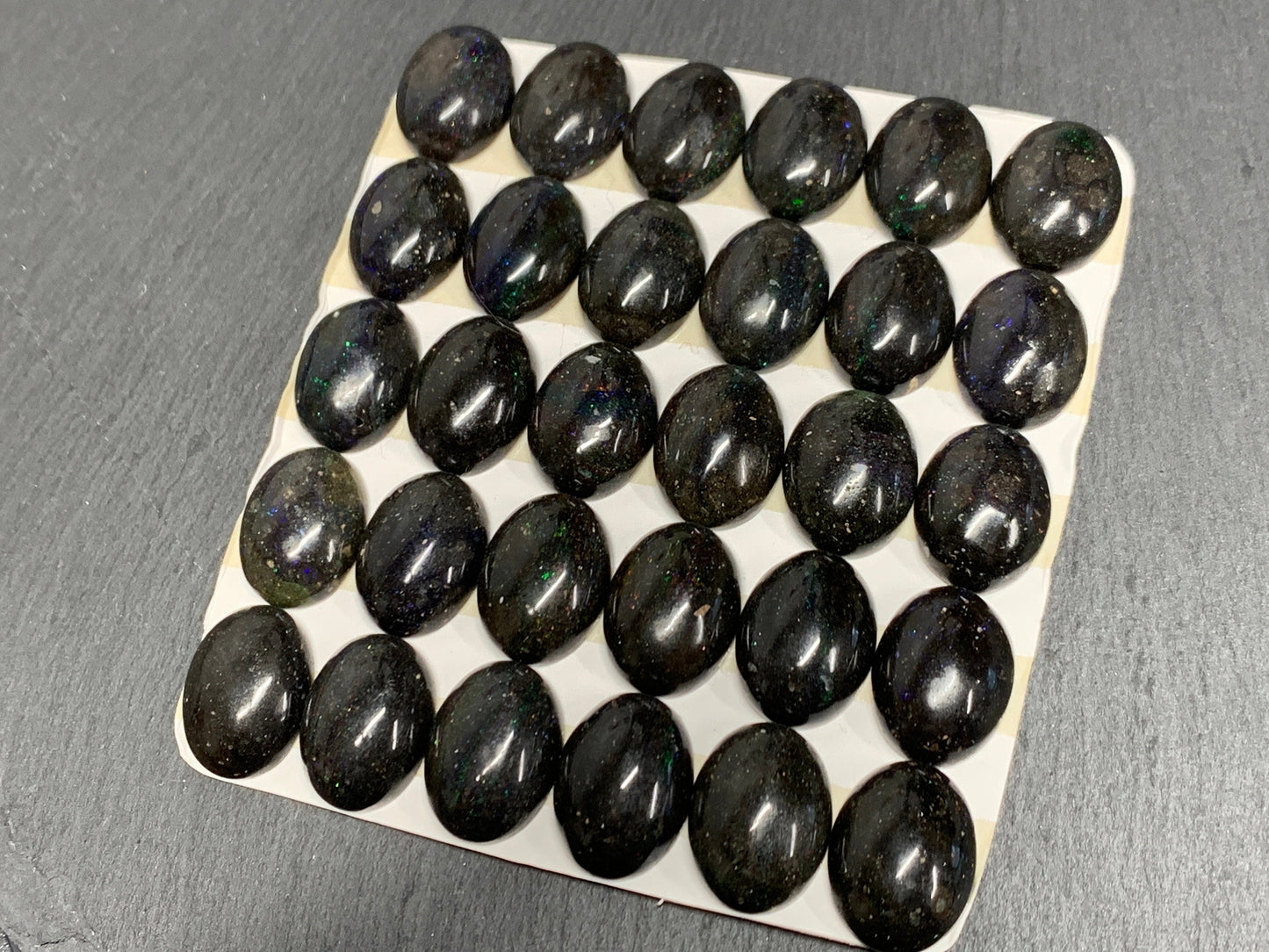 Black Andamooka Opal oval 10x14mm cabochon - Matrix Australian Opal