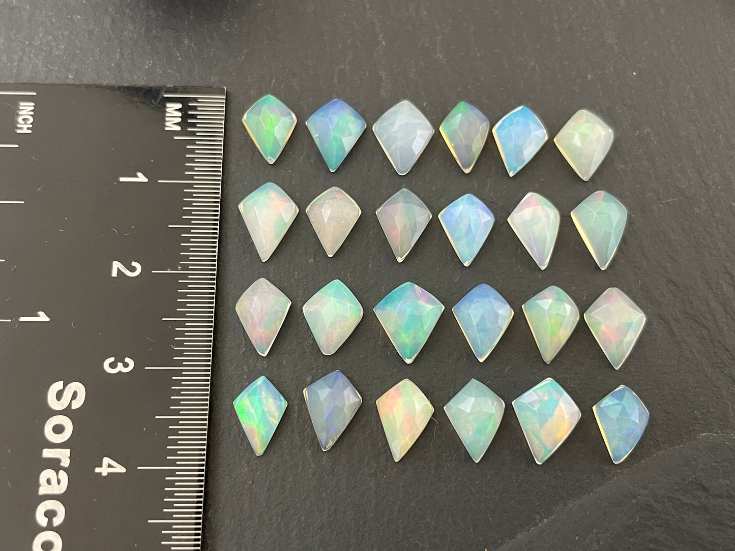 Faceted Ethiopian Opal kite 7-8mm long cabochon