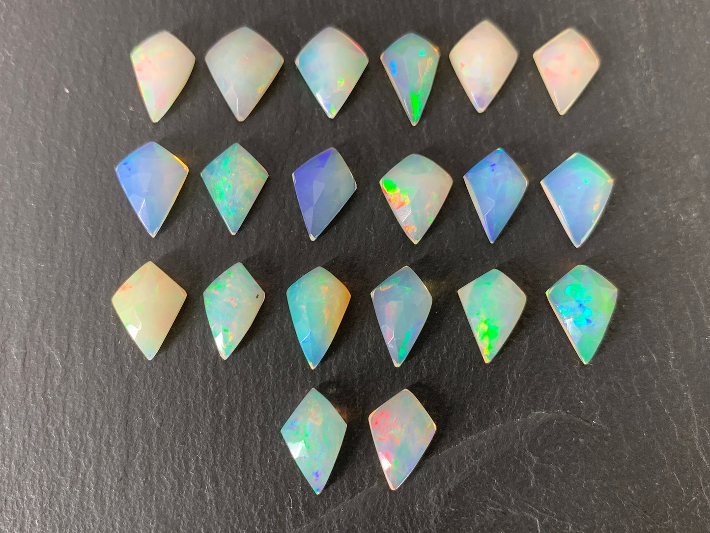 Faceted Ethiopian Opal kite 12-12.5mm long cabochon