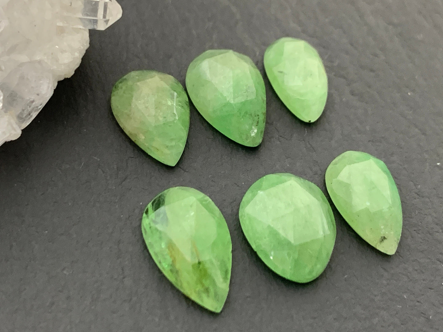 Faceted Tsavorite pear 12-14mm long cabochon