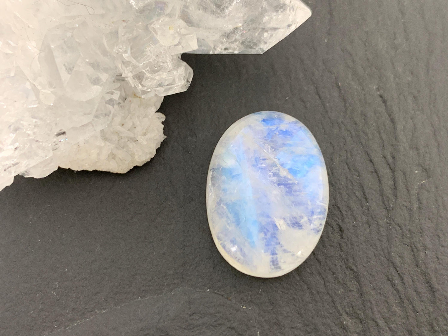 Rainbow Moonstone oval 20x14x6mm cabochon