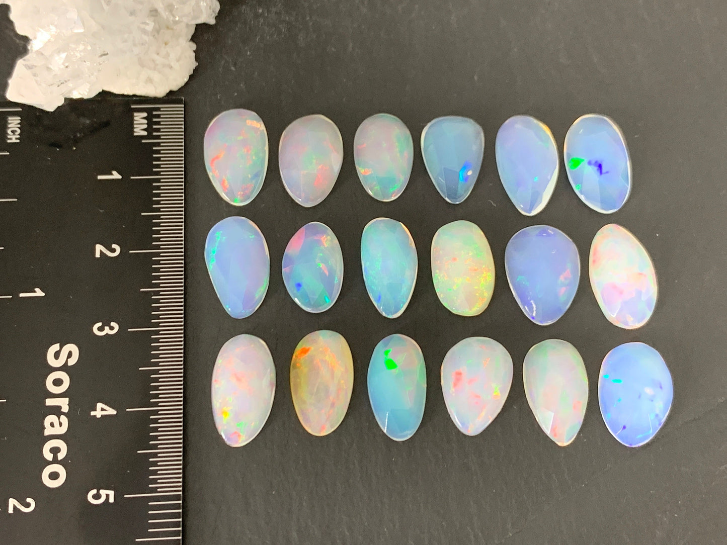 Faceted Ethiopian Opal oval 13mm cabochon