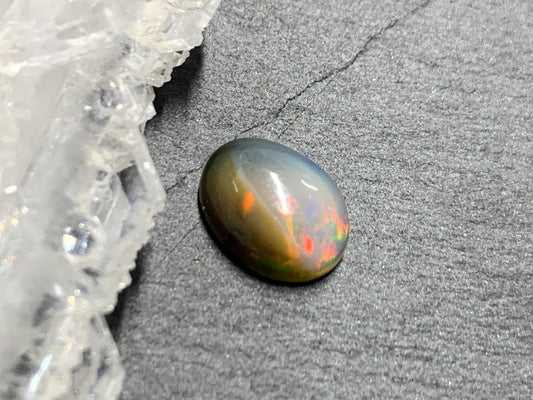 Natural Black Ethiopian Opal oval 7x10x4mm cabochon