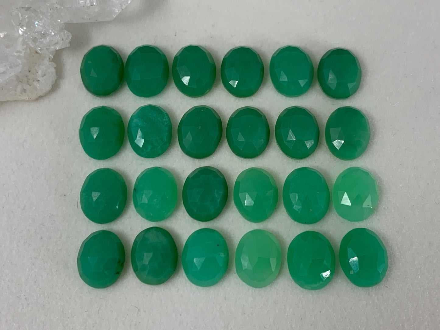 Faceted Chrysoprase oval 8x10mm cabochon