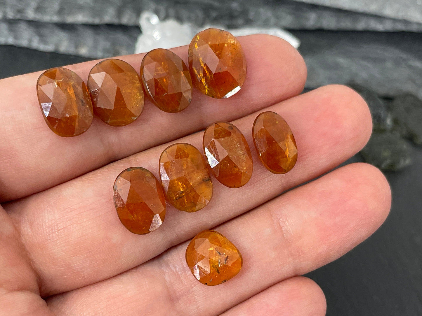 Faceted Orange Kyanite oval 9-12mm long cabochon