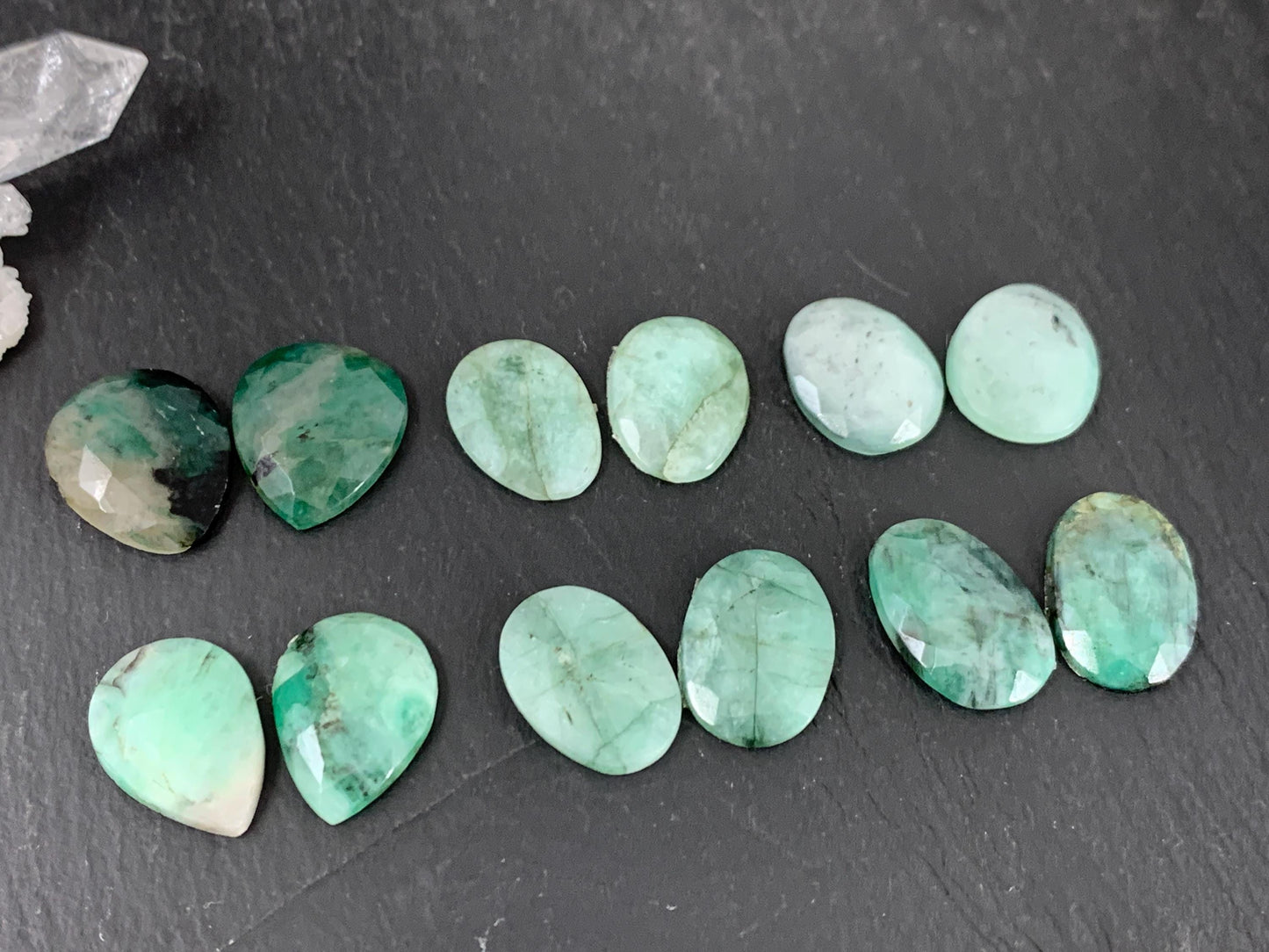 Faceted Emerald pair 15-17mm long cabochon