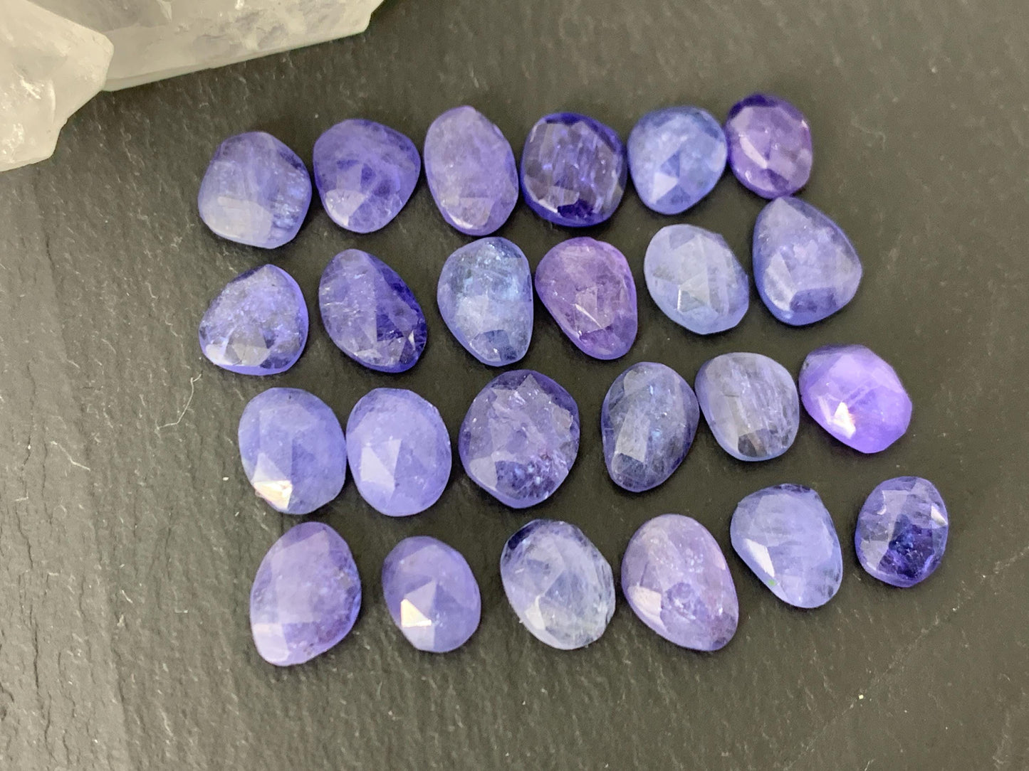 Discounted Damaged Faceted Tanzanite 8-10mm long cabochon