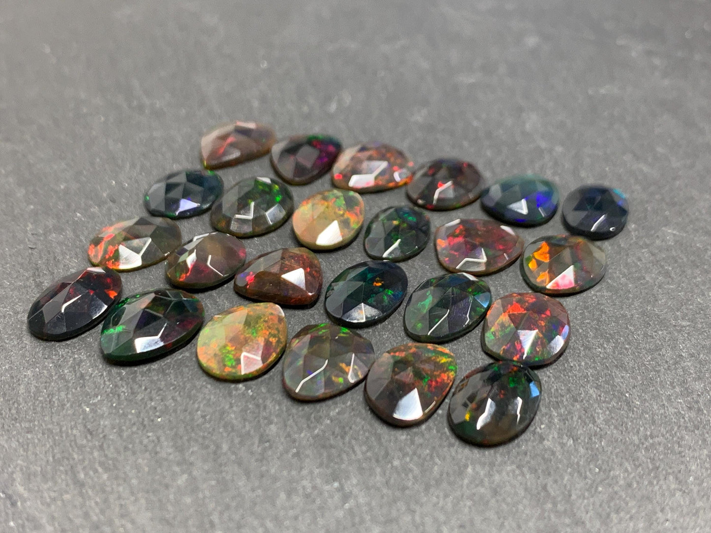 Faceted Black Ethiopian Opal 10-13mm long cabochon