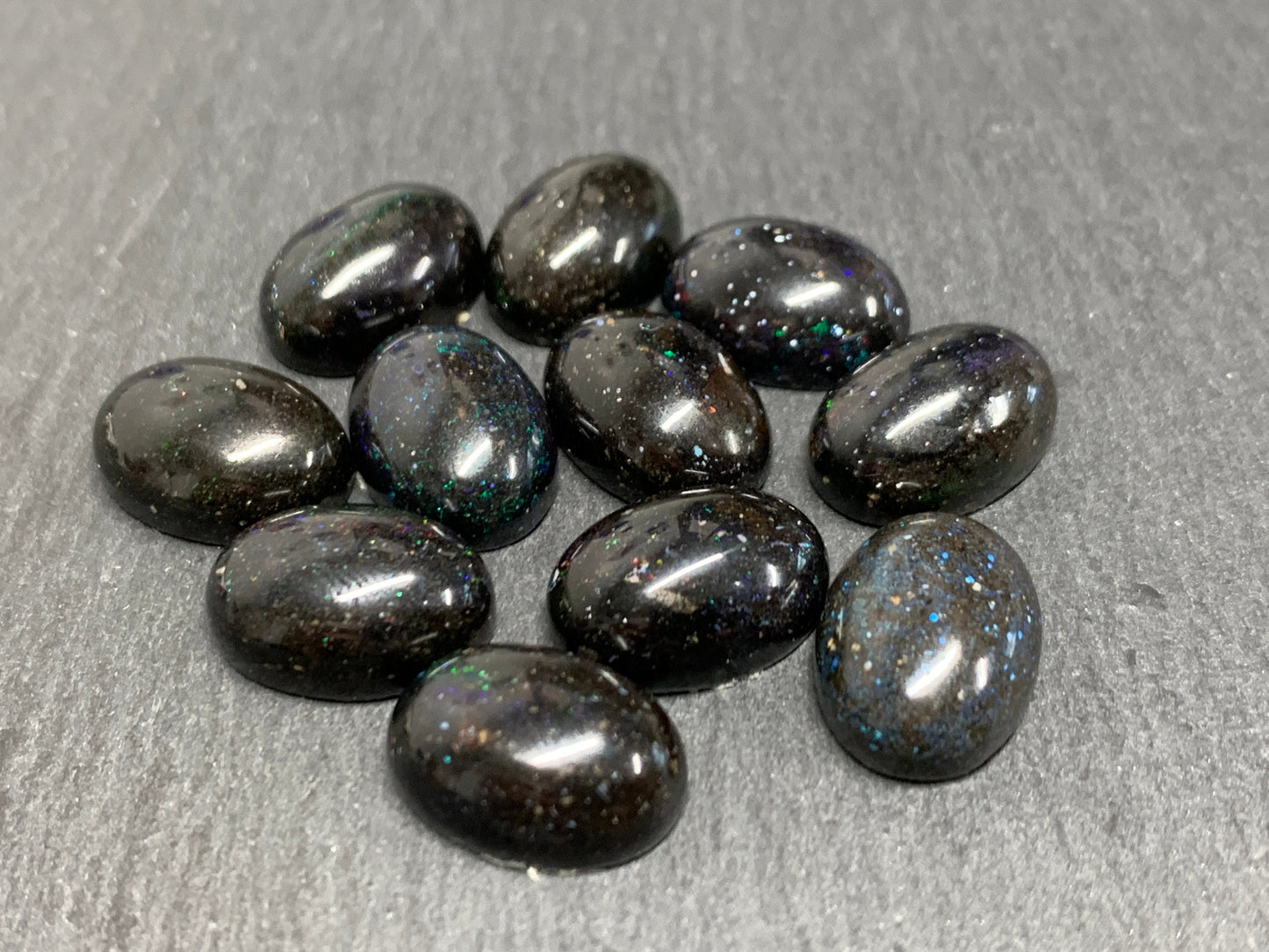 Black Andamooka Opal oval 10x14mm cabochon - Matrix Australian Opal