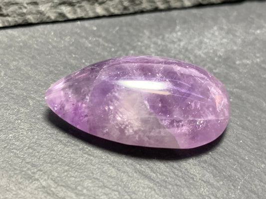 Amethyst pear 32x19x11mm cabochon- free form hand cut in Africa