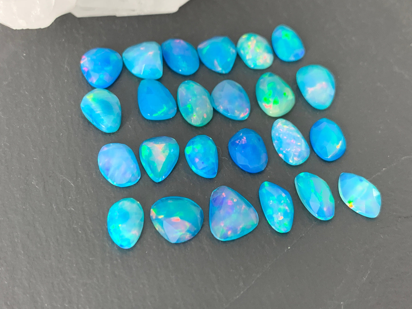 Faceted Blue Ethiopian Opal 9-10mm long cabochon