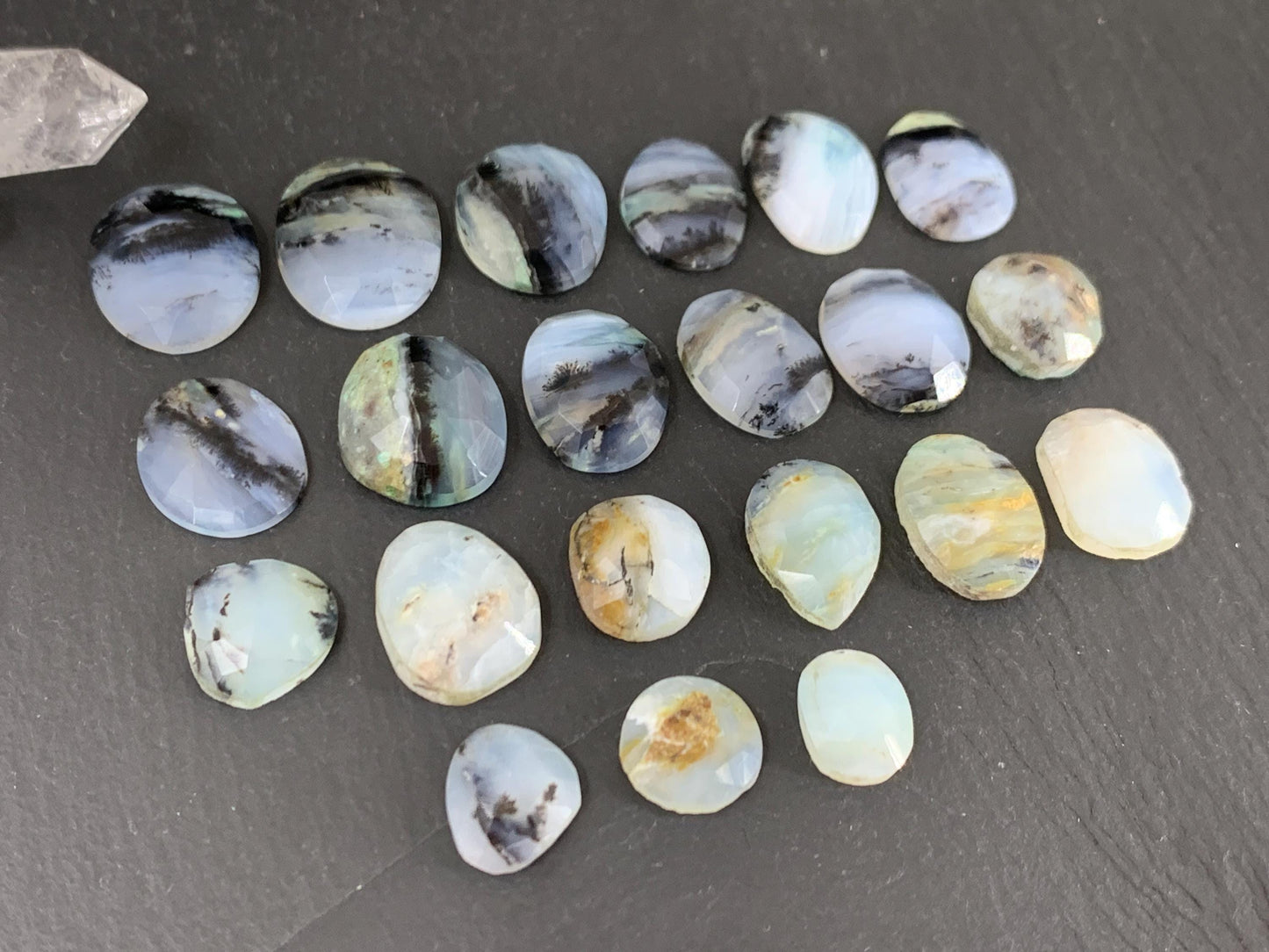 Faceted Peruvian Opal oval, pear 10-17mm long cabochon