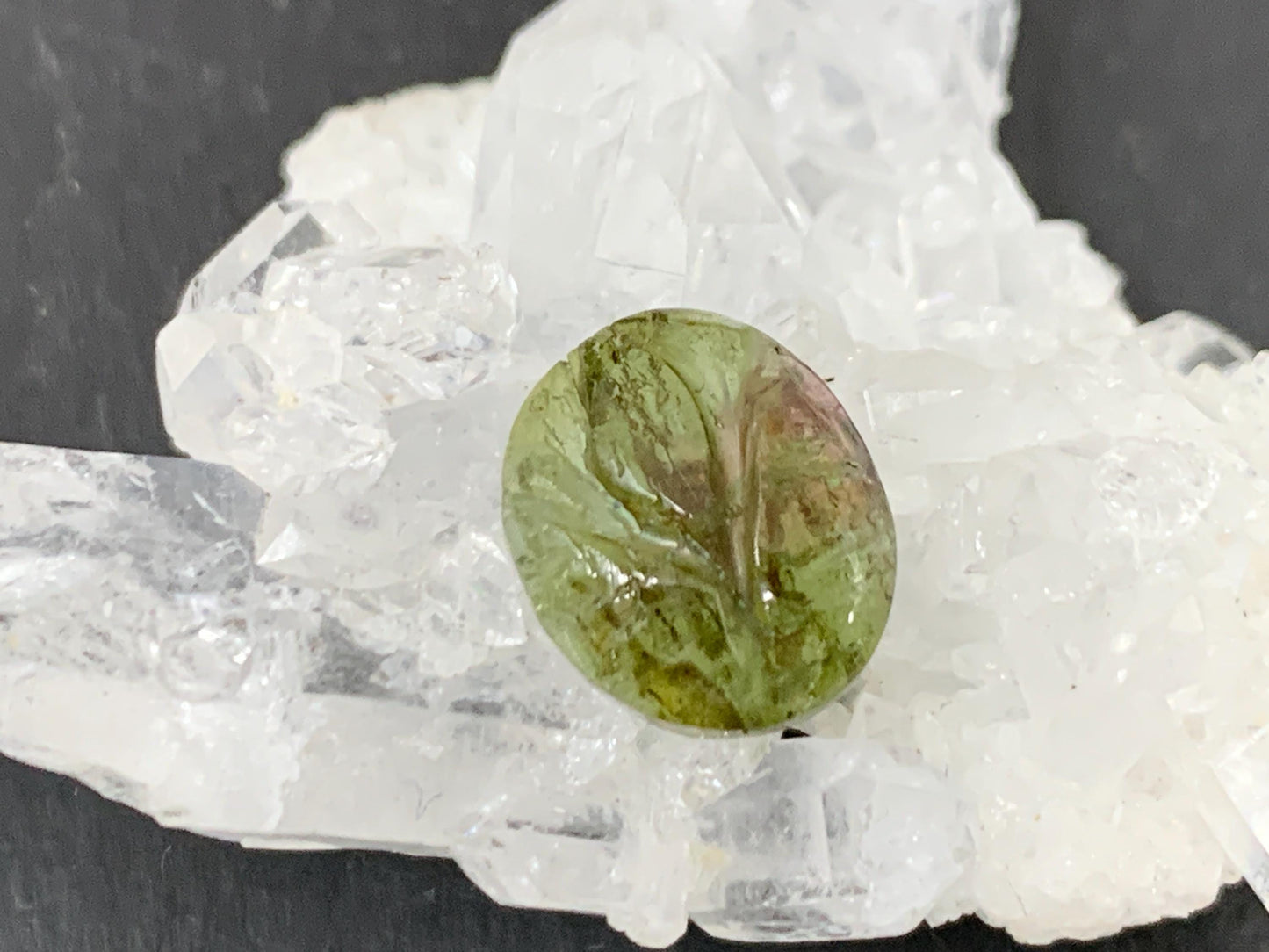 Carved Tourmaline 9x11x4mm cabochon