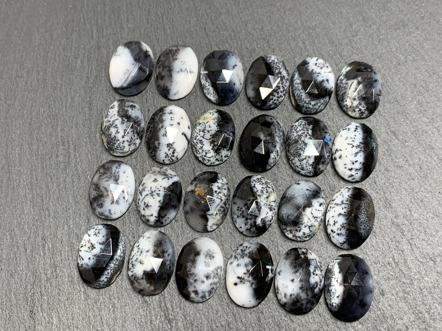 Faceted Dendrite Opal oval 10x14mm cabochon