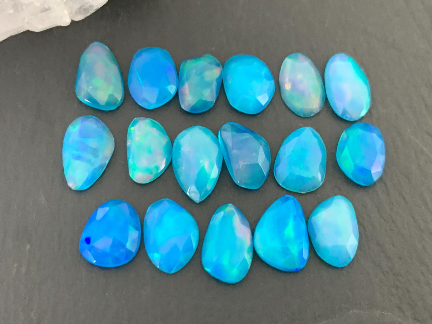 Faceted Blue Ethiopian Opal 9-10mm long cabochon