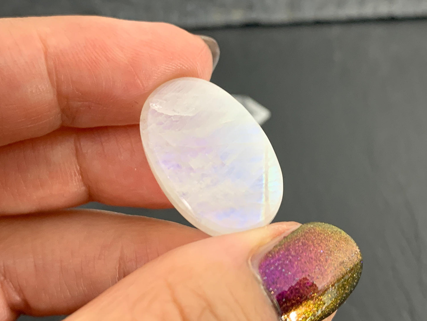 Rainbow Moonstone oval 25x16x8mm cabochon