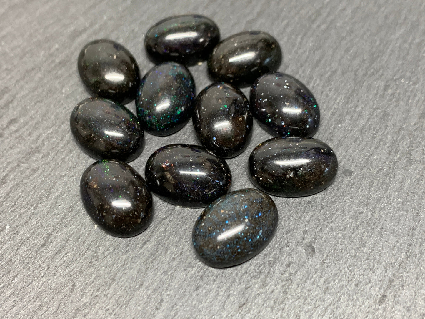 Black Andamooka Opal oval 10x14mm cabochon - Matrix Australian Opal