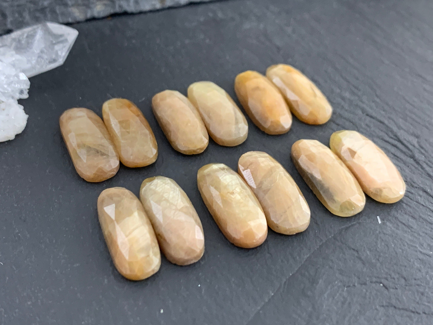 Pair of faceted Yellow Sapphire oval 8x20mm cabochon