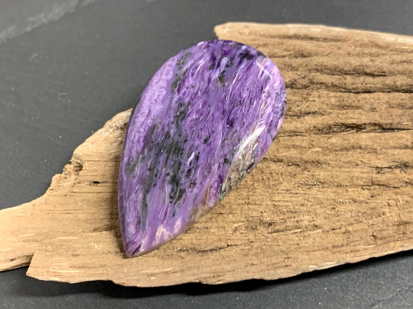 Charoite pear 50x30x7mm cabochon