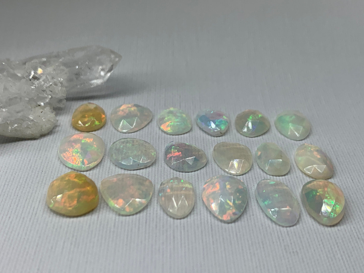 Faceted Ethiopian Opal 10-12mm long cabochon