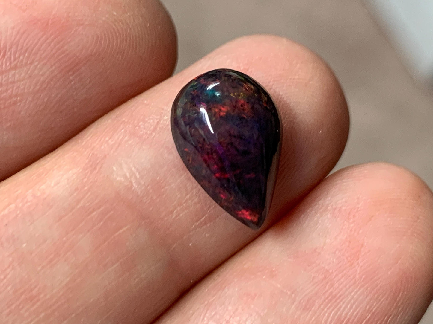 Black Ethiopian Opal pear 8x13x4mm cabochon