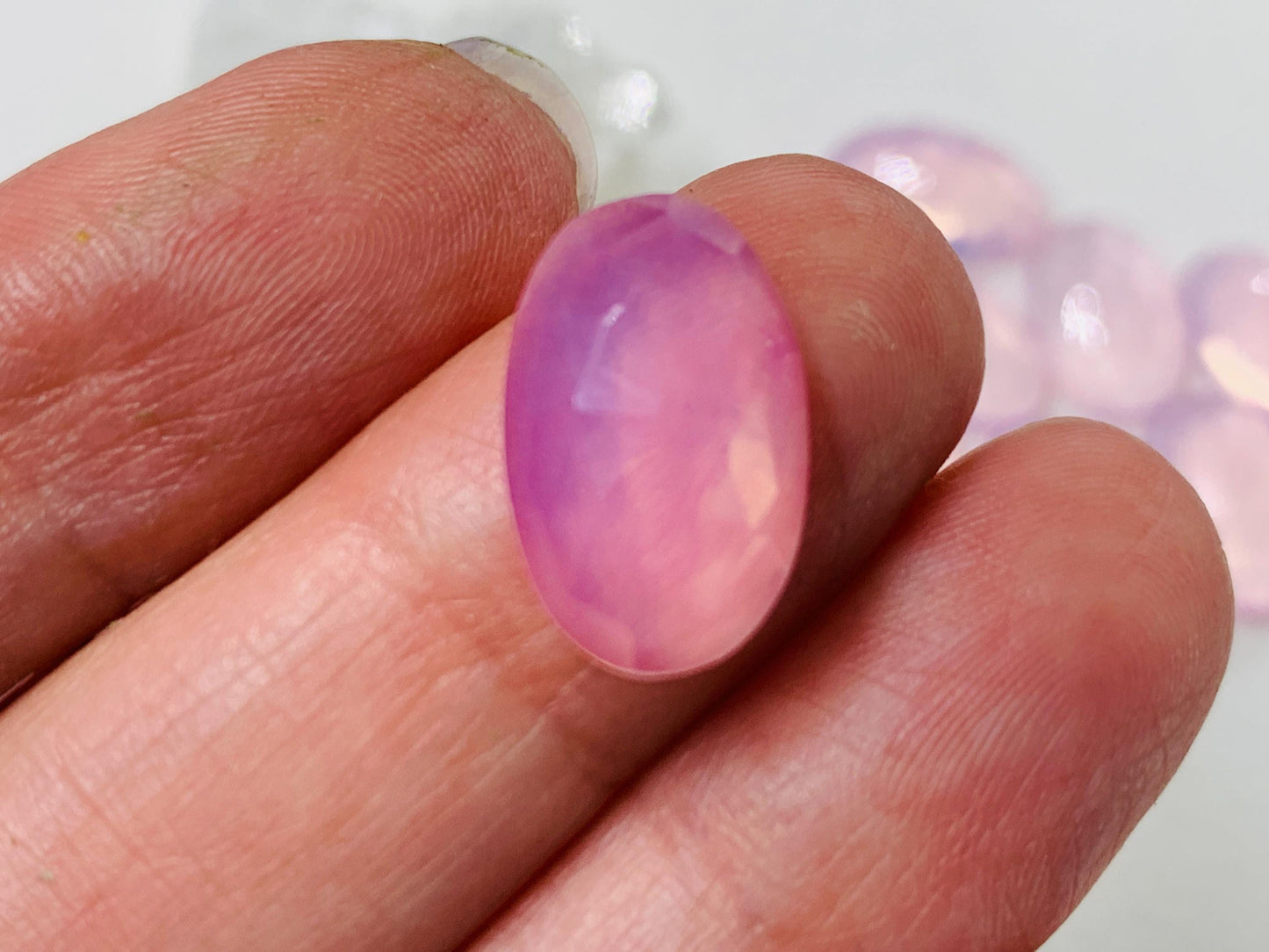 Faceted Rose Quartz oval 10x16mm cabochon - Lab created