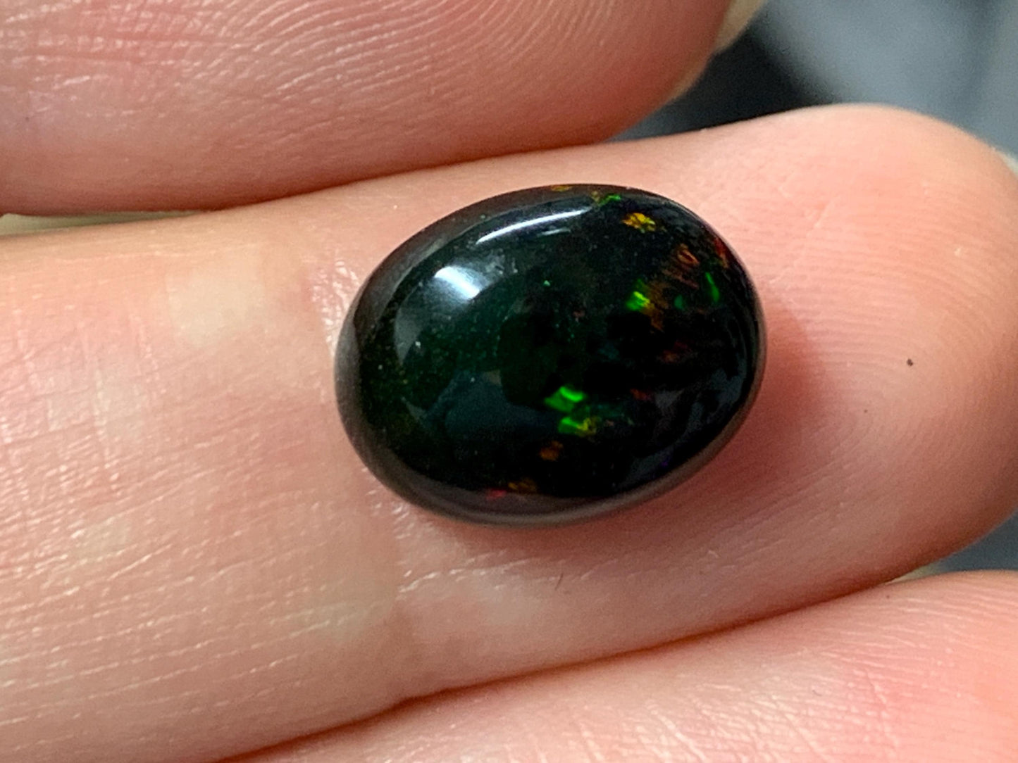 Natural Ethiopian Black Opal 9x12x5mm cabochon