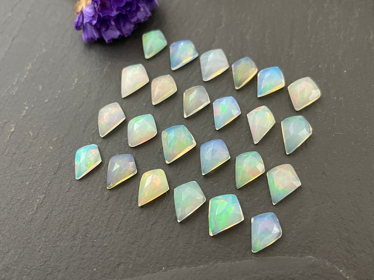 Faceted Ethiopian Opal kite 7-8mm long cabochon