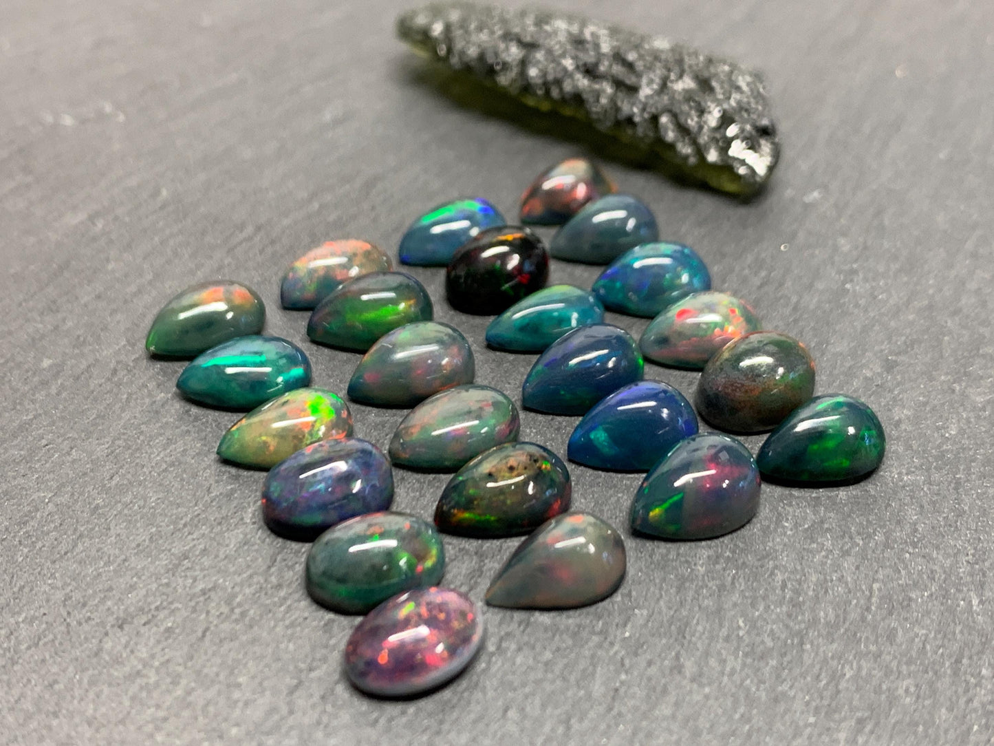 Black Ethiopian Opal pear 8-9mm long cabochon