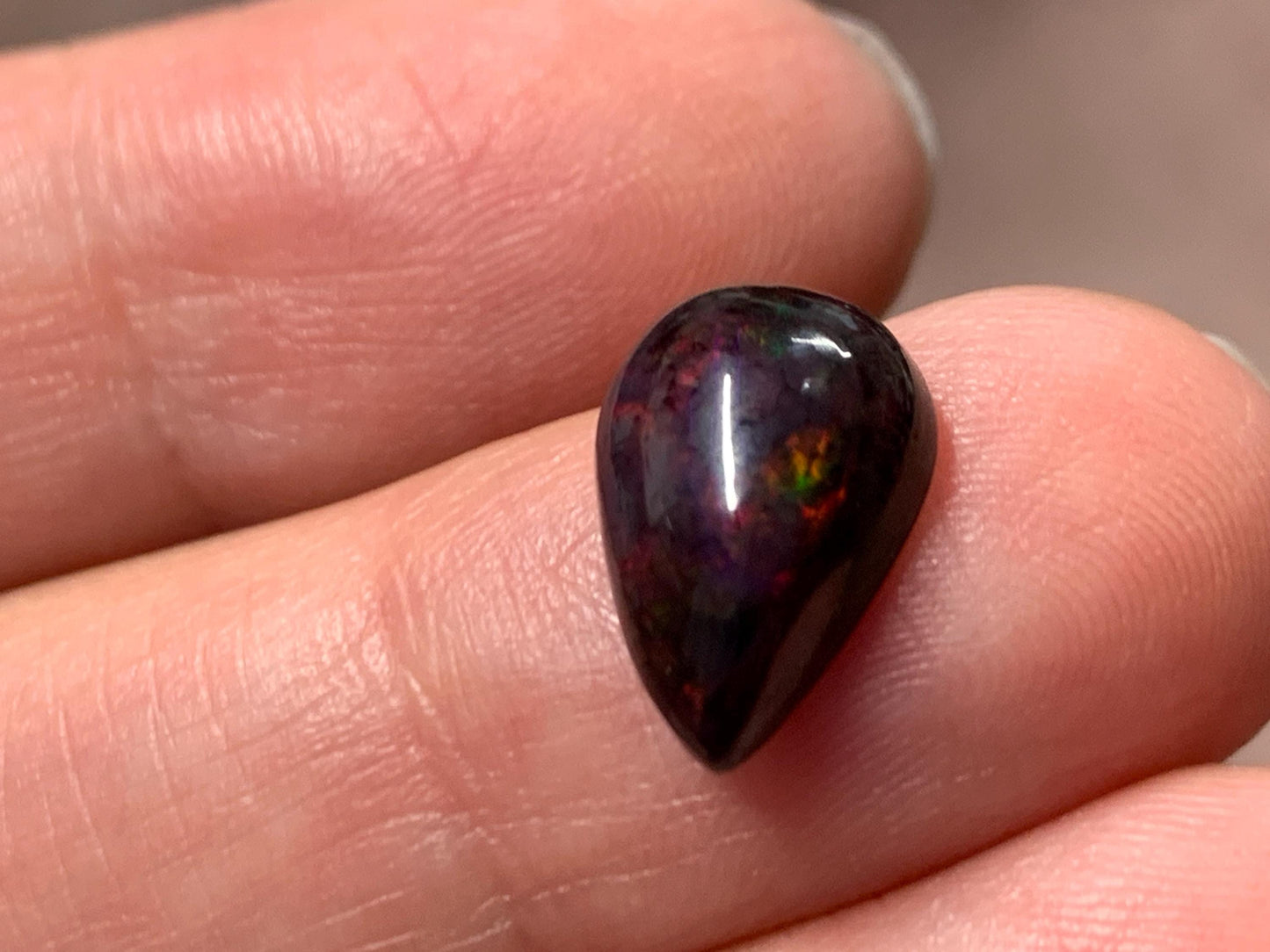 Black Ethiopian Opal pear 9x12x5mm cabochon