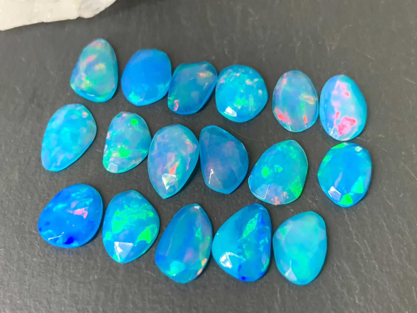 Faceted Blue Ethiopian Opal 9-10mm long cabochon