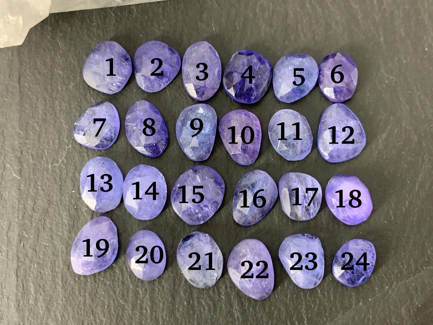 Discounted Damaged Faceted Tanzanite 8-10mm long cabochon
