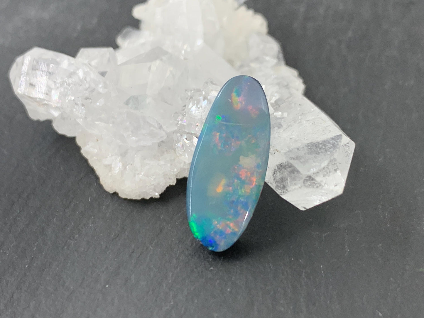 Australian Opal doublet 8x18x4mm cabochon - oval