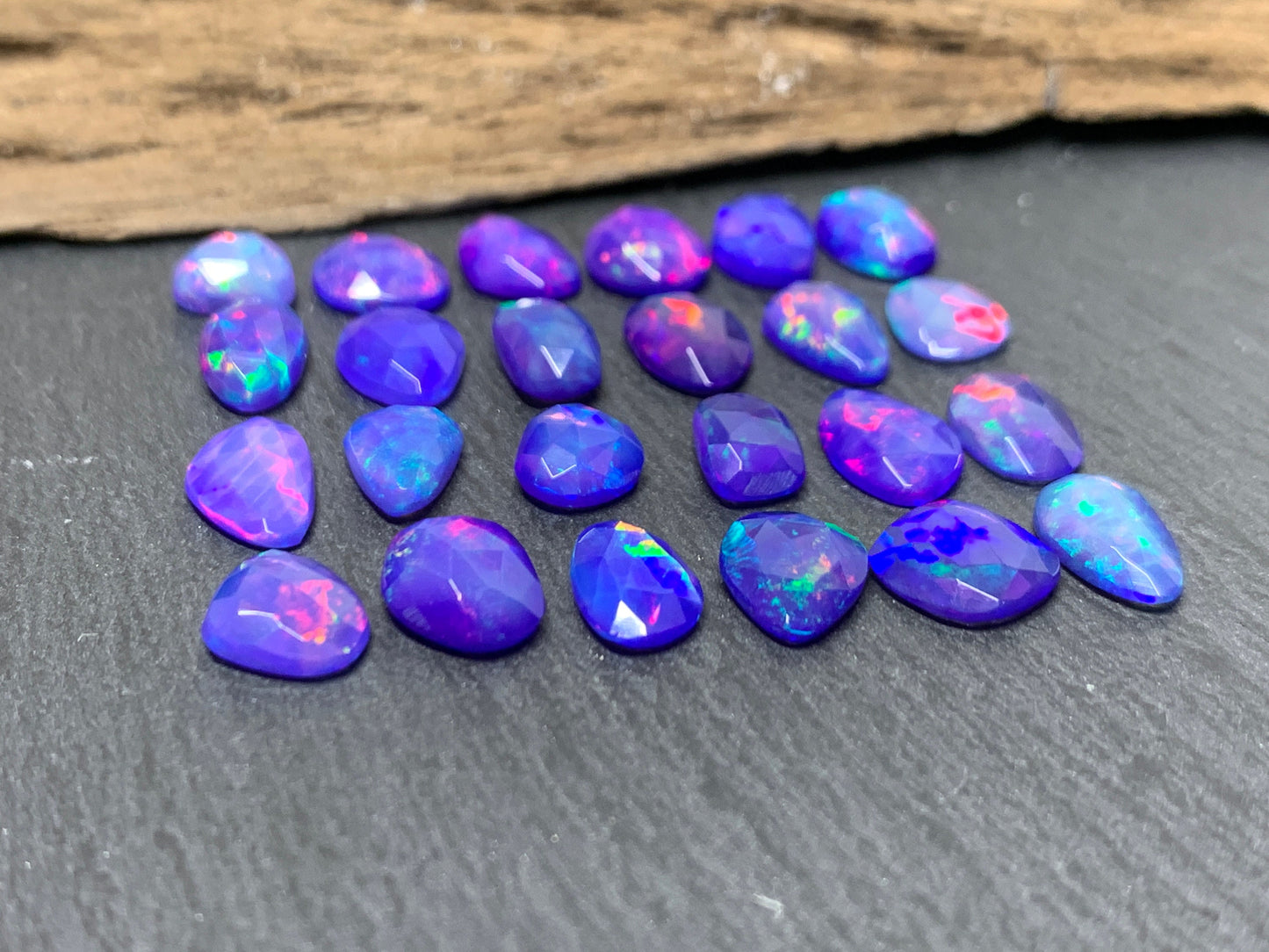 Faceted Purple Ethiopian Opal 7-10mm long cabochon