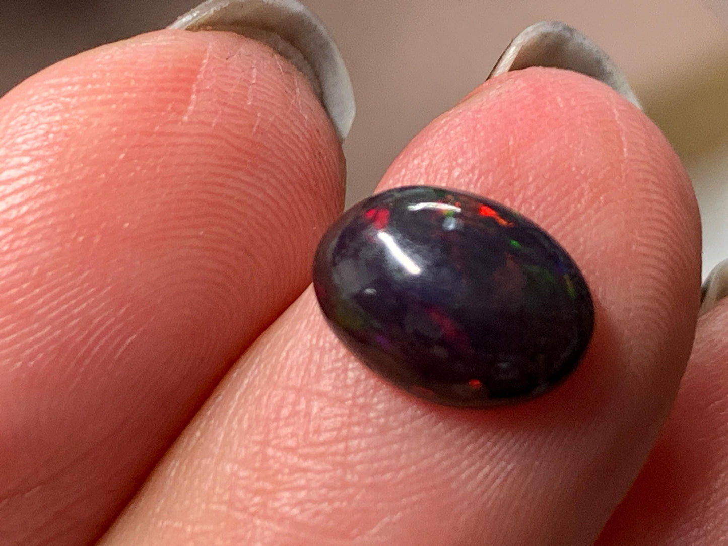 Natural Ethiopian Black Opal 7x9x3mm cabochon