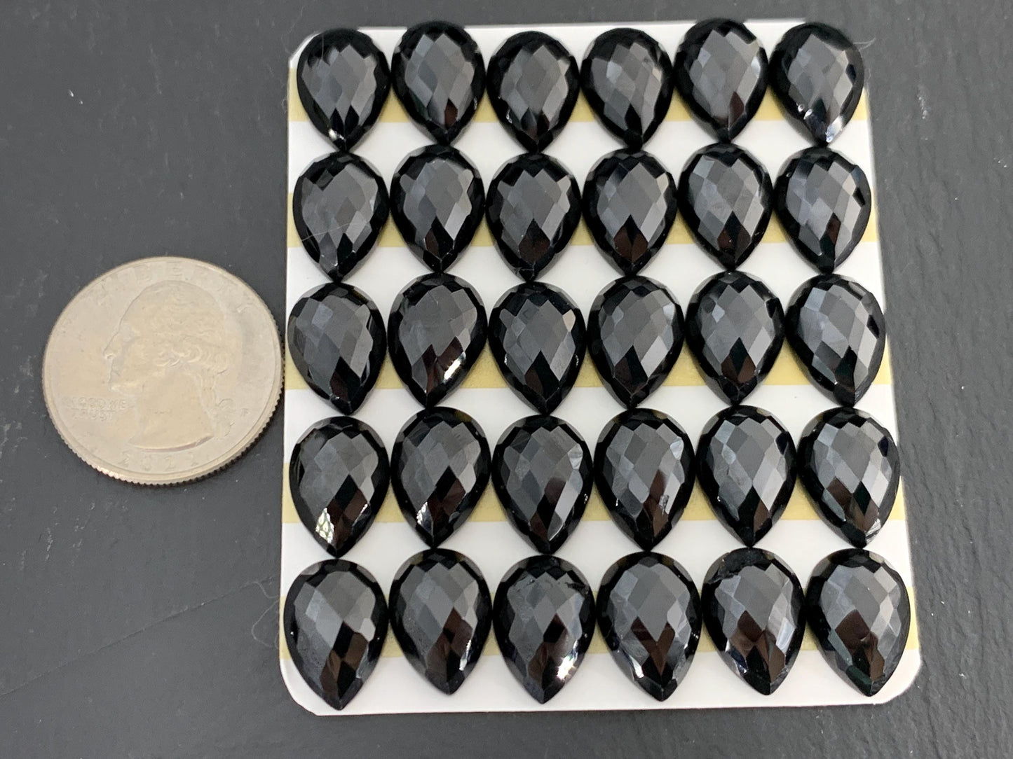 Faceted Black Spinel pear 10x14mm cabochon