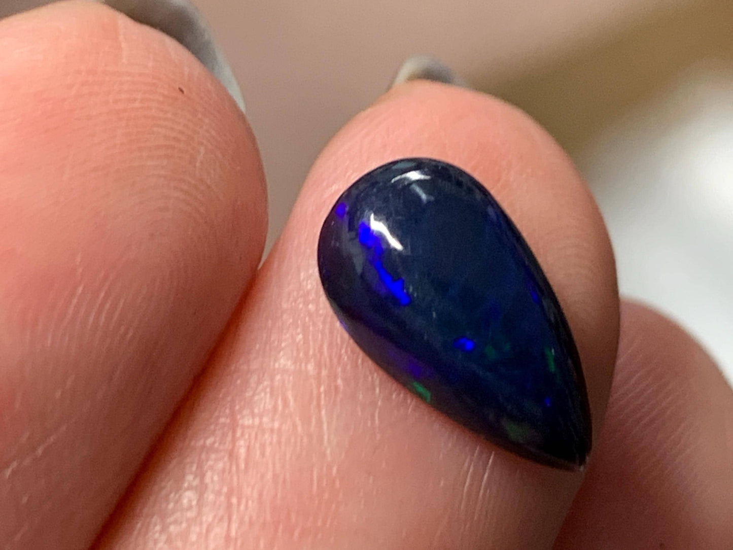 Natural Ethiopian Black Opal 7x12x4mm cabochon