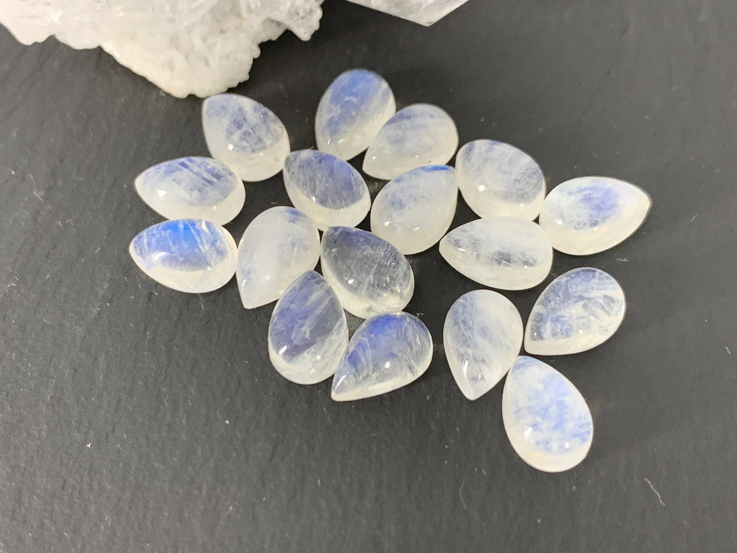 Rainbow Moonstone pear 6x9mm cabochon